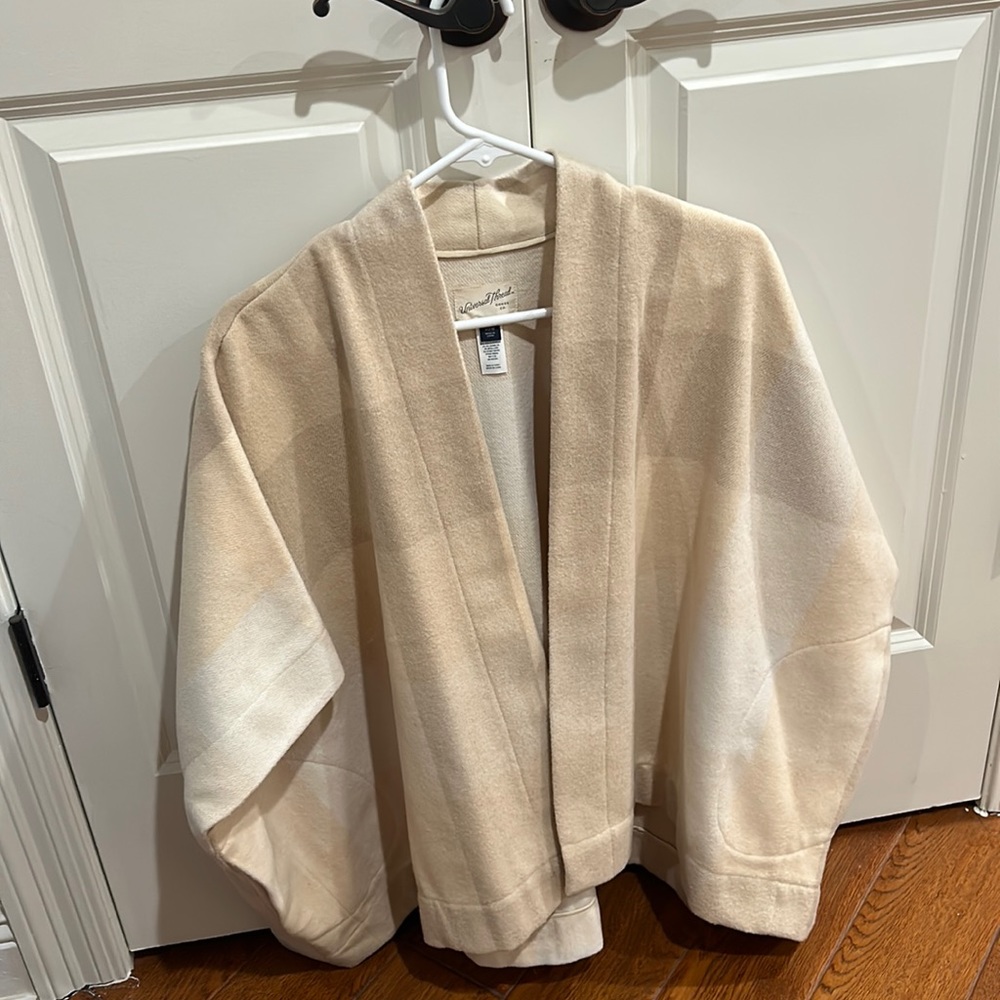 Cute tan colored universal thread poncho